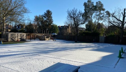 snow across a school playground