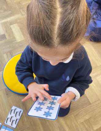 Girl playing maths game