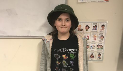 Girl wearing army hat