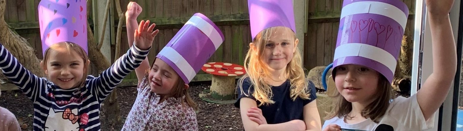 Reception girls wearing hats