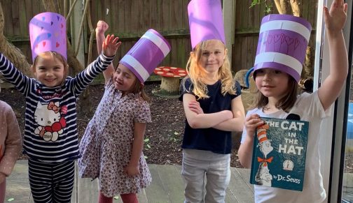 Reception girls wearing hats